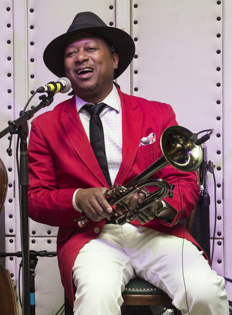 Kermit Ruffins singing and holding a trumpet at Little Gem Saloon in New Orleans, LA during the Basin Street Records 20th Anniversary Kickoff on May 5, 2017 for the album Live at Little Gem Saloon