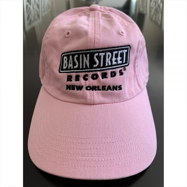 Pink baseball hat with black Basin Street Records logo on front